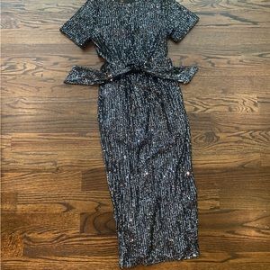 Black/Silver sequined cocktail dress. Side cut out and slits